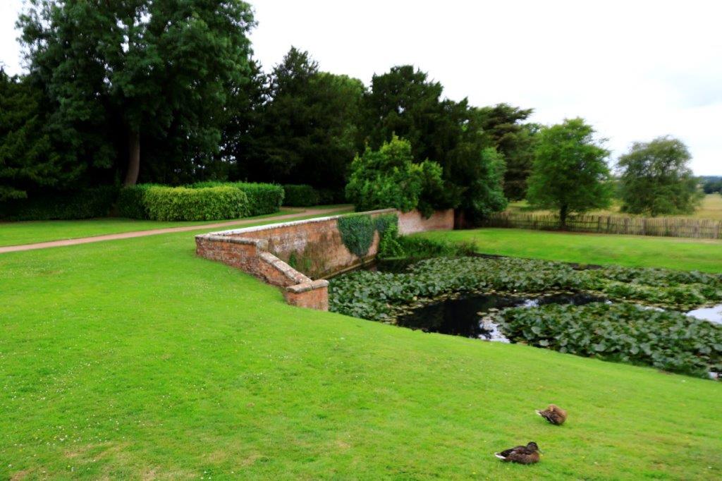 A clever bit of landscaping. What might be a bridge, except it's really a retaining wall.